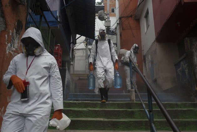 January 12, 2021, Rio De Janeiro, Rio de Janeiro, Brazil: DECEMBER 12 - avela Santa Marta residents clean the Favela, the number of deaths in this community has increased by more than 70%, in less than 15 days, Brazil reaches 201,460 deaths in 8,013,708 confirmed cases, updated the daily figures on the new pandemic coronavirus in Brazil. According to the latest data, the country exceeds the mark of 8 million infected due to the disease and now has 8,013,708 confirmed cases and 201,460 deaths by Covid-19.....In the last 24 hours alone, a further 52,035 were infected and 962 deaths from the disease were included. The lethality rate across the country at this time remains at 2.5%.............,........................,................, ....... - ZUMAt142 20210112_zap_t142_009 Copyright: xFabioxTeixeirax
