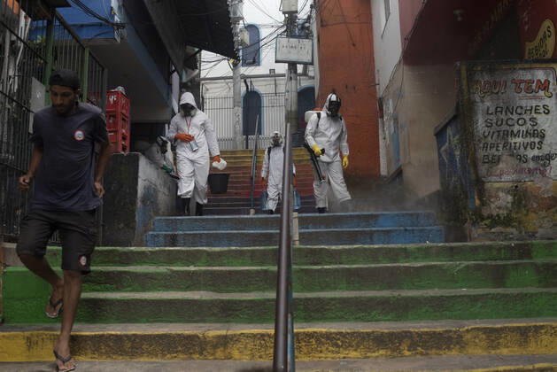 January 12, 2021, Rio De Janeiro, Rio de Janeiro, Brazil: DECEMBER 12 - avela Santa Marta residents clean the Favela, the number of deaths in this community has increased by more than 70%, in less than 15 days, Brazil reaches 201,460 deaths in 8,013,708 confirmed cases, updated the daily figures on the new pandemic coronavirus in Brazil. According to the latest data, the country exceeds the mark of 8 million infected due to the disease and now has 8,013,708 confirmed cases and 201,460 deaths by Covid-19.....In the last 24 hours alone, a further 52,035 were infected and 962 deaths from the disease were included. The lethality rate across the country at this time remains at 2.5%.............,........................,................, ....... - ZUMAt142 20210112_zap_t142_012 Copyright: xFabioxTeixeirax