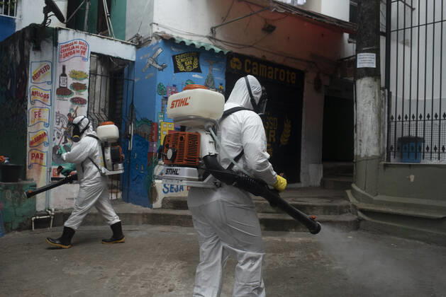 January 12, 2021, Rio De Janeiro, Rio de Janeiro, Brazil: DECEMBER 12 - avela Santa Marta residents clean the Favela, the number of deaths in this community has increased by more than 70%, in less than 15 days, Brazil reaches 201,460 deaths in 8,013,708 confirmed cases, updated the daily figures on the new pandemic coronavirus in Brazil. According to the latest data, the country exceeds the mark of 8 million infected due to the disease and now has 8,013,708 confirmed cases and 201,460 deaths by Covid-19.....In the last 24 hours alone, a further 52,035 were infected and 962 deaths from the disease were included. The lethality rate across the country at this time remains at 2.5%.............,........................,................, ....... - ZUMAt142 20210112_zap_t142_014 Copyright: xFabioxTeixeirax
