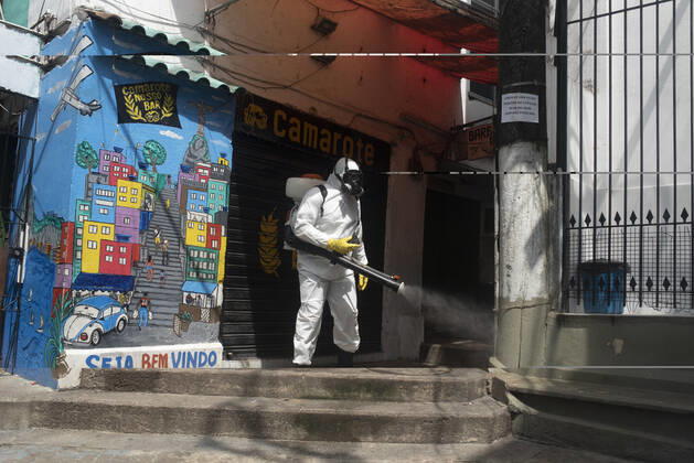 January 12, 2021, Rio De Janeiro, Rio de Janeiro, Brazil: DECEMBER 12 - avela Santa Marta residents clean the Favela, the number of deaths in this community has increased by more than 70%, in less than 15 days, Brazil reaches 201,460 deaths in 8,013,708 confirmed cases, updated the daily figures on the new pandemic coronavirus in Brazil. According to the latest data, the country exceeds the mark of 8 million infected due to the disease and now has 8,013,708 confirmed cases and 201,460 deaths by Covid-19.....In the last 24 hours alone, a further 52,035 were infected and 962 deaths from the disease were included. The lethality rate across the country at this time remains at 2.5%.............,........................,................, ....... - ZUMAt142 20210112_zap_t142_016 Copyright: xFabioxTeixeirax
