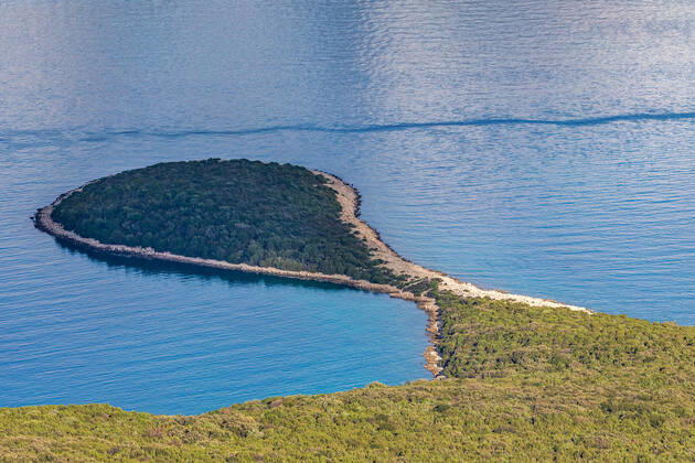 PXL_Osorscica mountain Photo taken on Jan. 12, 2021 show Osorscica mountain , Losinj Island, Croatia. Osorscica mountain spreads along the northern part of the island of Losinj from Cunski to Osor, and it is about 20 kilometres long. It is the first mountain on the islands of Adriatic to have attracted visitors, heir to the Austro-Hungarian throne Rudolf Habsburg was surely one of the first, having climbed Osorscica in 1887. Osorscica is well-known for many caves and the most famous are St. Gaudentius cave, located below the peak Televrina on the eastern side, and Vela Jama on the western side of Televrina. It is about 40 metres deep and remains of people were found here from about 10.000 years ago. SreckoxNiketic PIXSELL