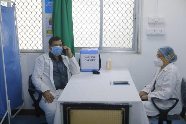 January 12, 2021, Mumbai: 12Jan2021 - Mumbai , INDIA :.Doctors with Vaccine carrier refrigerated case at Cooper Hospital Mumbai where a Covid19 Vaccination center has been set up to inoculate the 15 million population of the city Of Mumbai...Preparations are on full swing for the Mass Covid19 Vaccination drive that will begin in India on 16th Jan 2021 Mumbai - ZUMAsu5_ 20210112_zap_su5_004 Copyright: xSubhashxSharmax