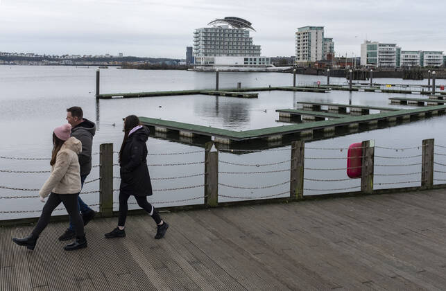 January 12, 2021, Cardiff, Wales, United Kingdom: People walk around the Pierhead at Cardiff Bay in Wales..1,332 new cases of the coronavirus have been recorded today bringing the total to 172,879 since the pandemic began. The overall death total now stands at 3,997 in Wales. The infection rate is now 403.5 cases per 100,000 people based on the seven days up to January 7. That is down on the 415 previously reported. Cardiff United Kingdom - ZUMAs197 20210112_zab_s197_010 Copyright: xMayxJamesx