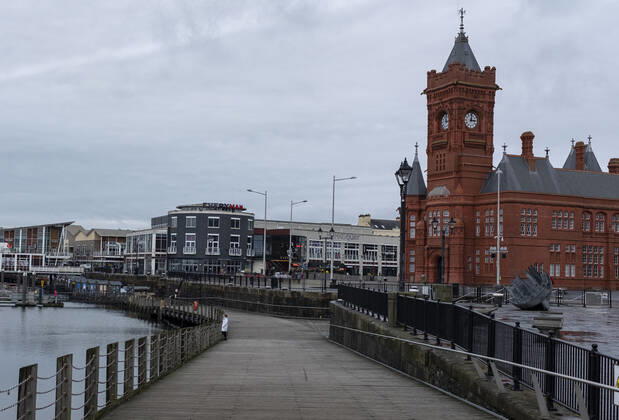 January 12, 2021, Cardiff, Wales, United Kingdom: A man looks out at Pierhead at Cardiff Bay in Wales..1,332 new cases of the coronavirus have been recorded today bringing the total to 172,879 since the pandemic began. The overall death total now stands at 3,997 in Wales. The infection rate is now 403.5 cases per 100,000 people based on the seven days up to January 7. That is down on the 415 previously reported. Cardiff United Kingdom - ZUMAs197 20210112_zab_s197_011 Copyright: xMayxJamesx