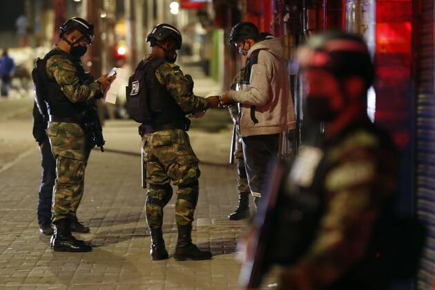 Soldiers requisition a man who violates the curfew imposed by mayor today in Bogota, Colombia 12 January 2021. The city ended a strict quarantine on Tuesday that was in force during the Reyes Bridge last weekend and today a curfew begins to apply in all localities from eight at night to four in the morning, as will extend until next Sunday. Colombia adds another 14,179 infections and 331 deaths from covid-19 !ACHTUNG: NUR REDAKTIONELLE NUTZUNG!  Copyright: xMauricioxDuenasxCastanedax AME9103 20210113-637461146478370660