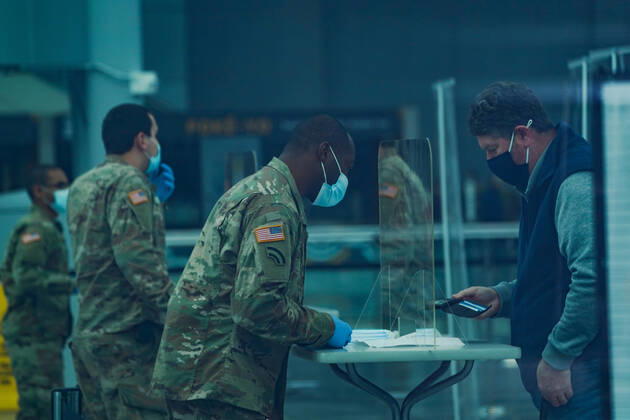 January 13, 2021, New York, New York, USA: A member of the US Army National Guard checks in people as New York State opens a mass vaccination site at the Jacob Javits Convention Center on Manhattan s West Side on January 13, 2021 in New York. New York USA - ZUMAb148 20210113_zap_b148_018 Copyright: xBryanxSmithx