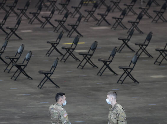 Empty chairs serve as a recovery area for patients who have just received the COVID-19 vaccination at the Jacob K. Javits Convention Center in New York City on Wednesday, January 13, 2021. The Javits Convention Center which served as a massive field hospital last spring when New York City was the epicenter of the pandemic, now will serve as a huge vaccine distribution center.  NYP20210113102 JohnxAngelillo