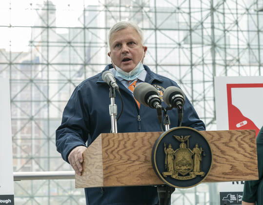 NY: Opening of mass vaccination site at Jacob Javits Center Director of Emergency Management Michael Kopy speaks during opening of vaccination site at Jacob Javits Center. Health care personnel, medical examiners, funeral workers, coroners, essential workers, police officers, firefighters, people older than 65 and more eligible right now to get vaccination in New York State. New York New York United States Copyright: LevxRadin