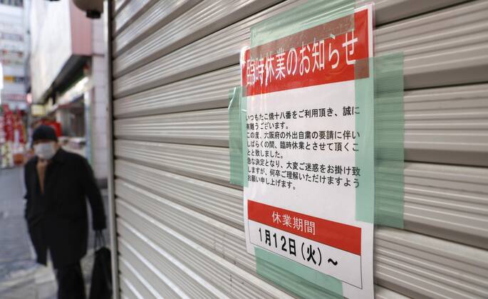 Day after Japan expands coronavirus emergency to 7 more prefectures A takoyaki octopus dumplings restaurant remains closed in Osaka on Jan. 14, 2021, a day after Japanese Prime Minister Yoshihide Suga declared a state of emergency in seven additional prefectures, including Osaka, amid the continued spread of the novel coronavirus. A sign posted on the restaurant s shutter reads closed indefinitely since Jan. 12 in response to the Osaka prefectural government s stay-at-home request to people amid the virus pandemic. 