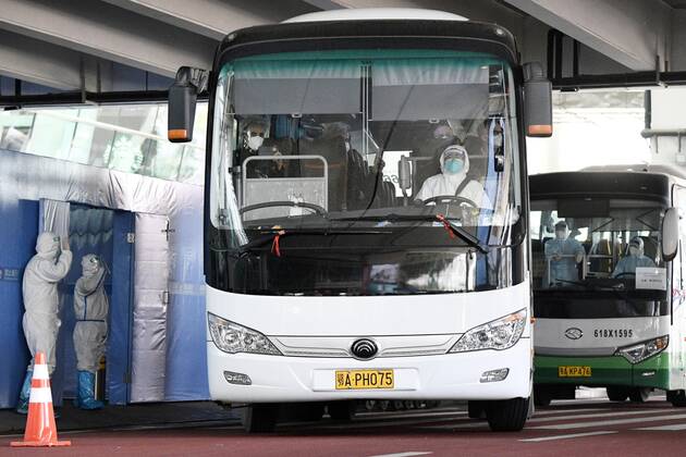WHO team to investigate coronavirus origins in Wuhan A bus carrying a team of experts from the World Health Organization departs an airport in Wuhan on Jan. 14, 2021, after arriving in the Chinese city to investigate the origins of the novel coronavirus. The 10-member team is expected to conduct the research in Wuhan, where Chinese authorities reported the first coronavirus case in December 2019, for about two weeks, after being quarantined at a local hotel for about two weeks. 