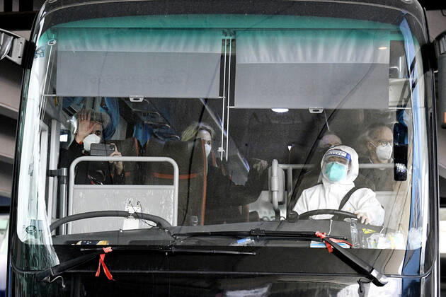 WHO team to investigate coronavirus origins in Wuhan A bus carrying a team of experts from the World Health Organization departs an airport in Wuhan on Jan. 14, 2021, after arriving in the Chinese city to investigate the origins of the novel coronavirus. The 10-member team is expected to conduct the research in Wuhan, where Chinese authorities reported the first coronavirus case in December 2019, for about two weeks, after being quarantined at a local hotel for about two weeks. 