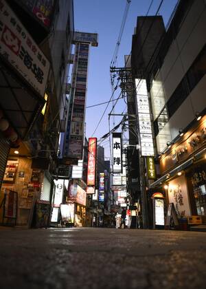 Day after Japan expands coronavirus emergency to 7 more prefectures A street lined with bars and restaurants is quiet in Osaka s Kita Ward on Jan. 14, 2021, a day after Japanese Prime Minister Yoshihide Suga declared a state of emergency in seven additional prefectures, including Osaka, amid the continued spread of the novel coronavirus.