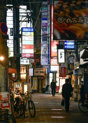 Day after Japan expands coronavirus emergency to 7 more prefectures A street lined with bars and restaurants is quiet in Osaka s Kita Ward on Jan. 14, 2021, a day after Japanese Prime Minister Yoshihide Suga declared a state of emergency in seven additional prefectures, including Osaka, amid the continued spread of the novel coronavirus.