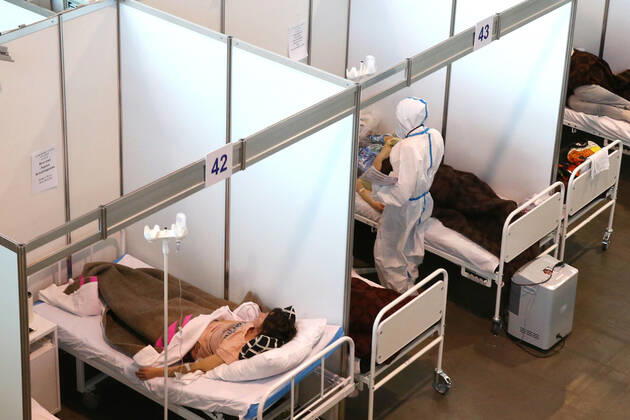 ST PETERSBURG, RUSSIA - JANUARY 14, 2021: Units in the Red Zone of a temporary infectious diseases hospital that treats COVID-19 patients at the Lenexpo Exhibition Complex. Peter Kovalev TASS  TS0F4261