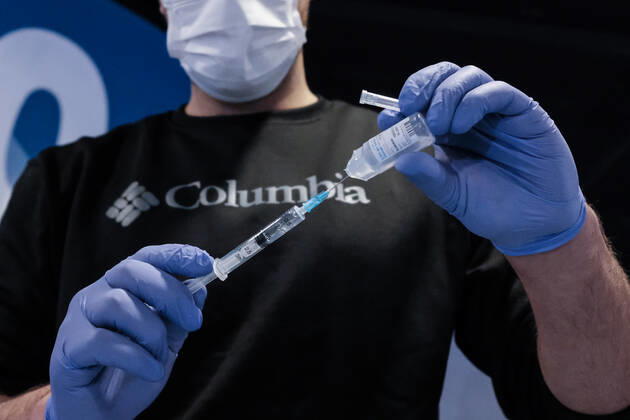 January 14, 2021, Jerusalem, Israel: Nurses administer COVID-19 vaccines at the Pais Arena Sports Complex in Jerusalem, converted into a Coronavirus vaccination center. Criteria is now either health workers, education workers, or the general public 50 years of age and above. The number of Israeli citizens who have received at least one dose of the Pfizer BioNTech vaccine has exceeded 2M as a mass vaccination campaign continues, and so does COVID-19 infection in the general public. Jerusalem Israel - ZUMAa126 20210114_zap_a126_003 Copyright: xNirxAlonx