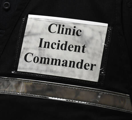 January 14, 2021, Racine, Wisconsin, USA: City Health Department Epidemiologist CODY PEARCE oversees the logistics as the first of the first 70 doses of 140 doses of the Pfizer COVID-19 vaccine received for City of Racine firefighters are administered Thursday January 14, 2021 to at the city health department in City Hall. The remaining doses will be administered Friday. Racine USA - ZUMAh154 20210114_znp_h154_001 Copyright: xMarkxHertzbergx