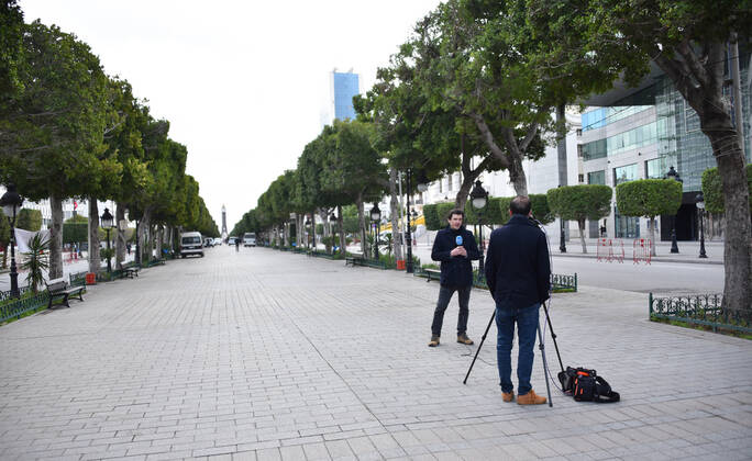 January 14, 2021, Tunis, Tunisia: Kournalists seen on avenue habib bourguiba due to the Covid-19 pandemic as the country marks 10 years since its revolution. Tunisia marked 10 years today since its street revolution sent autocratic ruler Zine El Abidine Ben Ali fleeing into exile, but few are celebrating amid a lockdown as Covid-19 cases spiral. Tunis Tunisia - ZUMAs197 20210114_zaa_s197_104 Copyright: xJdidixWassimx