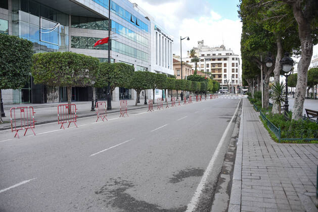 January 14, 2021, Tunis, Tunisia: Tunis famous avenue Habib Bourguiba is pictured empty amid of a lockdown due to the Covid-19 pandemic as the country marks 10 years since its revolution. Tunisia marked 10 years today since its street revolution sent autocratic ruler Zine El Abidine Ben Ali fleeing into exile, but few are celebrating amid a lockdown as Covid-19 cases spiral. Tunis Tunisia - ZUMAs197 20210114_zaa_s197_108 Copyright: xJdidixWassimx