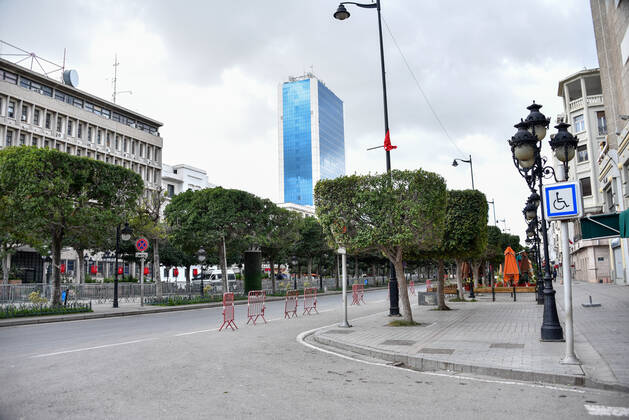 January 14, 2021, Tunis, Tunisia: Tunis famous avenue Habib Bourguiba is pictured empty amid of a lockdown due to the Covid-19 pandemic as the country marks 10 years since its revolution. Tunisia marked 10 years today since its street revolution sent autocratic ruler Zine El Abidine Ben Ali fleeing into exile, but few are celebrating amid a lockdown as Covid-19 cases spiral. Tunis Tunisia - ZUMAs197 20210114_zaa_s197_112 Copyright: xJdidixWassimx