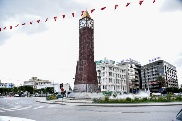 January 14, 2021, Tunis, Tunisia: Tunis famous avenue Habib Bourguiba with the Clock Tower is pictured empty amid of a lockdown due to the Covid-19 pandemic as the country marks 10 years since its revolution. Tunisia marked 10 years today since its street revolution sent autocratic ruler Zine El Abidine Ben Ali fleeing into exile, but few are celebrating amid a lockdown as Covid-19 cases spiral. Tunis Tunisia - ZUMAs197 20210114_zaa_s197_113 Copyright: xJdidixWassimx