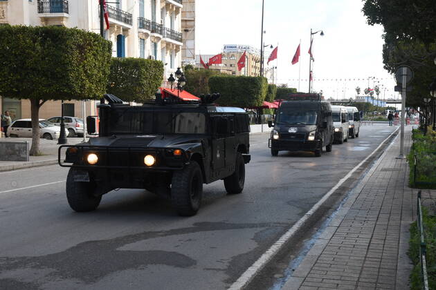 (210114) -- TUNIS, Jan. 14, 2021 -- Police vehicles run on a road during a lockdown in Tunis, Tunisia, on Jan. 14, 2021. Tunisia decided to impose a general lockdown for a period of four days starting from Thursday, to contain the rapid spread of COVID-19 in the country. (Photo by Xinhua) TUNISIA-TUNIS-COVID-19-LOCKDOWN AdelxEzzine 
