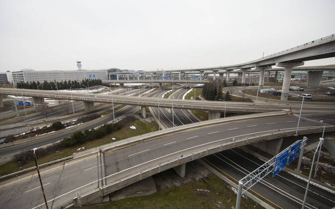 (210114) -- TORONTO, Jan. 14, 2021 -- Highways are seen with less traffic near Toronto Pearson International Airport in Missisauga, Ontario, Canada, on Jan. 14, 2021. Ontario s stay-at-home order went into effect on Thursday, requiring residents to stay home except for essential outings. (Photo by Xinhua) CANADA-ONTARIO-COVID-19-STAY-AT-HOME ORDER ZouxZheng 