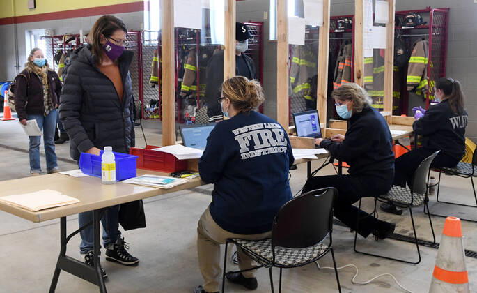 January 15, 2021, Oconomowoc, Wisconsin, USA: 119 firefighters and other front-line health profession workers were vaccinated against the Coronavirus with the Pfizer vaccine Friday January 15, 2021 at the Western Lakes Fire Department headquarters in Oconomowoc, Wisconsin, bringing the weekÃ¢â‚¬â ¢s total to 798. The rural fire department has six stations serving about 200 sq. miles. Oconomowoc USA - ZUMAh154 20210115_znp_h154_019 Copyright: xMarkxHertzbergx