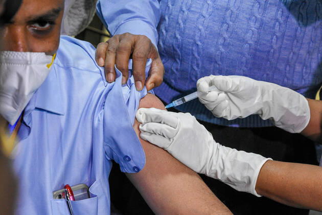 January 16, 2021, Kolkata, West Bengal, India: A sister injects COVISHIELD vaccine into a patients body during vaccination.With urgent effect , COVID vaccination drives starts in India from 16th of January 2021.The vaccination progrmae are allotted exclusive to the frontline health workers in its first phase of vaccine drive. As of now, COVISHIELD and COVAXIN has been approved by Indian government for use for vaccination. Kolkata India - ZUMAc211 20210116_zip_c211_012 Copyright: xDebarchanxChatterjeex