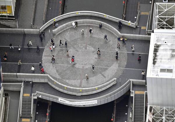 Osaka Pref. under coronavirus state of emergency Photo taken Jan. 16, 2021, from a Kyodo News helicopter shows far fewer pedestrians than usual in Osaka s Minami area on the first weekend after Osaka Prefecture was added to a list of places under a coronavirus state of emergency. 