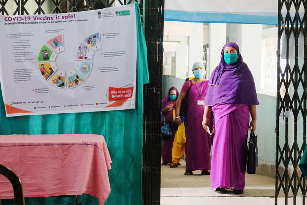 January 16, 2021, Kolkata, West Bengal, India: Heath workers wait to get vaccinated with Covishield Coronavirus vaccine developed by Oxford University and AstraZeneca Plc and Produced by Serum Institute Of India, at the Madhyamgram Hospital. After a year since the coronavirus pandemic began, claiming over 150.000 lives in India, Prime Minister Narendra Modi launched a nationwide vaccination drive against Covid-19, today. Kolkata India - ZUMAs197 20210116_zaa_s197_053 Copyright: xDipayanxBosex