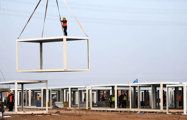 SHIJIAZHUANG, CHINA - JANUARY 16: Workers at the construction site of a centralized quarantine site with a total of 3,000 prefabricated rooms amid the coronavirus outbreak on January 16, 2021 in Shijiazhuang, Hebei Province of China.  Copyright: xVCGx CFP111313953233