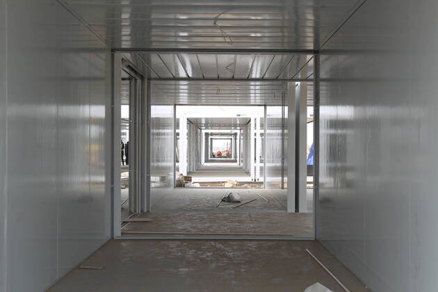 SHIJIAZHUANG, CHINA - JANUARY 15: Workers at the construction site of a centralized quarantine site with a total of 3,000 prefabricated rooms amid the coronavirus outbreak on January 15, 2021 in Shijiazhuang, Hebei Province of China.  Copyright: xVCGx CFP111313910577