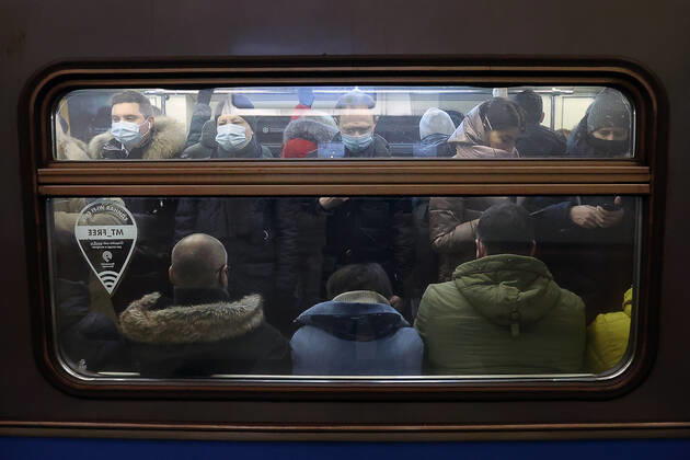 MOSCOW, RUSSIA - JANUARY 18, 2021: Passengers in face masks travel on a Moscow Metro train amid the ongoing COVID-19 pandemic. Vyacheslav Prokofyev TASS  TS0F47A2
