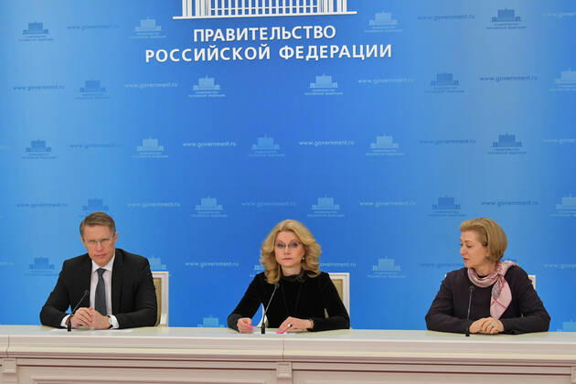 MOSCOW, RUSSIA - JANUARY 18, 2021: Russia s Healthcare Minister Mikhail Murashko, Russia s Deputy Prime Minister Tatyana Golikova, head of the emergency response center to prevent the spread of the novel coronavirus, and Russian Chief Sanitary Physician Anna Popova (L-R), head of the Russian Federal Service for Surveillance on Consumer Rights Protection and Human Wellbeing (Rospotrebnadzor), hold a briefing at the House of the Russian Government. Alexander Astafyev POOL TASS  TS0F47FA