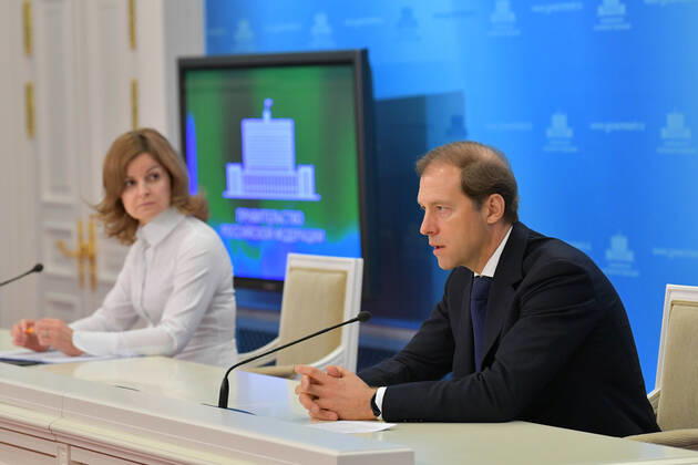 MOSCOW, RUSSIA - JANUARY 18, 2021: Russia s Industry and Trade Minister Denis Manturov (R) holds a briefing at the House of the Russian Government. Alexander Astafyev POOL TASS  TS0F47FD