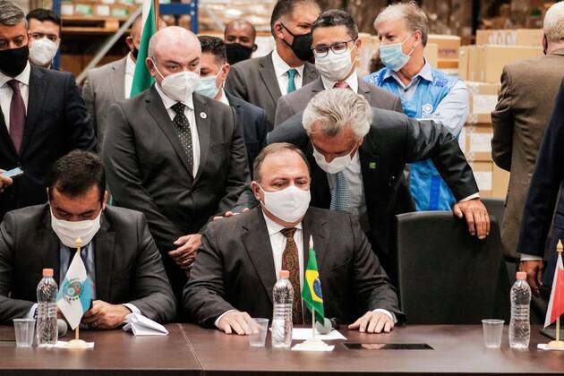 Distribuition of CORONAVAC -COVID-19 - vaccine in Brazil Distribuition of CORONAVAC -COVID-19 - vaccine in Brazil. January 18, 2021, Guarulhos, Sao Paulo, Brazil: Brazilian minister of health, Eduardo Pazuello, participates in a symbolic act for the distribution of doses of Coronavac - an immunizing agent developed by the Butantan Institute against the new coronavirus - carried out at the Logistics Distribution Center of the Ministry in Guarulhos, Sao Paulo. Several Brazilian governors meeting with Minister Pazuello entered into an agreement for vaccination against covid-19 to begin in the country today, at 5 pm . Distribuition of CORONAVAC -COVID-19 - vaccine in Brazil  Copyright: xFepesilx