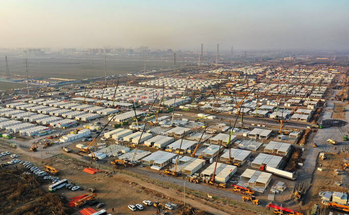 (210118) -- SHIJIAZHUANG, Jan. 18, 2021 -- Aerial photo taken on Jan. 18, 2021 shows the Huangzhuang apartment COVID-19 quarantine center under construction in Shijiazhuang, north China s Hebei Province. Construction of the main structures of the Huangzhuang apartment COVID-19 quarantine center in Shijiazhuang is nearing the end. With a total floor area of 34 hectares, the facility will house close contacts or secondary close contacts of COVID-19 confirmed cases. ) CHINA-HEBEI-SHIJIAZHUANG-COVID-19-QUARANTINE CENTER-CONSTRUCTION (CN) YangxShiyao 