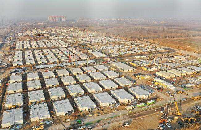 (210118) -- SHIJIAZHUANG, Jan. 18, 2021 -- Aerial photo taken on Jan. 18, 2021 shows the Huangzhuang apartment COVID-19 quarantine center under construction in Shijiazhuang, north China s Hebei Province. Construction of the main structures of the Huangzhuang apartment COVID-19 quarantine center in Shijiazhuang is nearing the end. With a total floor area of 34 hectares, the facility will house close contacts or secondary close contacts of COVID-19 confirmed cases. ) CHINA-HEBEI-SHIJIAZHUANG-COVID-19-QUARANTINE CENTER-CONSTRUCTION (CN) YangxShiyao 
