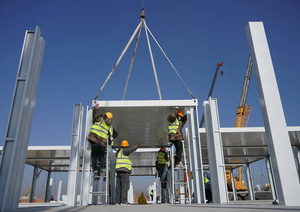 (210118) -- SHIJIAZHUANG, Jan. 18, 2021 -- Workers build the Huangzhuang apartment COVID-19 quarantine center in Shijiazhuang, north China s Hebei Province, Jan. 18, 2021. Construction of the main structures of the Huangzhuang apartment COVID-19 quarantine center in Shijiazhuang is nearing the end. With a total floor area of 34 hectares, the facility will house close contacts or secondary close contacts of COVID-19 confirmed cases. ) CHINA-HEBEI-SHIJIAZHUANG-COVID-19-QUARANTINE CENTER-CONSTRUCTION (CN) YangxShiyao 
