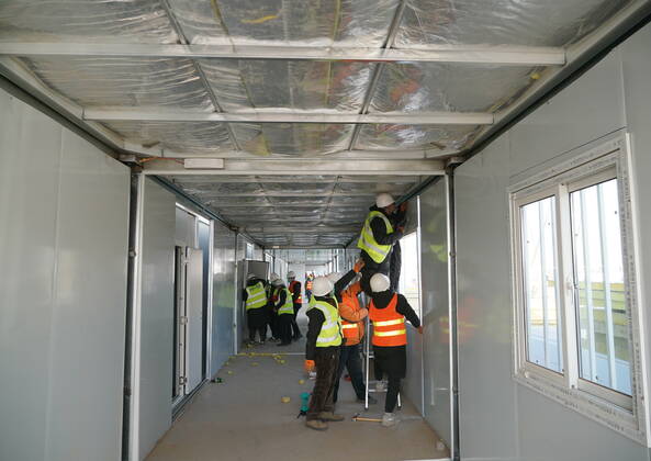 (210118) -- SHIJIAZHUANG, Jan. 18, 2021 -- Workers build the Huangzhuang apartment COVID-19 quarantine center in Shijiazhuang, north China s Hebei Province, Jan. 18, 2021. Construction of the main structures of the Huangzhuang apartment COVID-19 quarantine center in Shijiazhuang is nearing the end. With a total floor area of 34 hectares, the facility will house close contacts or secondary close contacts of COVID-19 confirmed cases. ) CHINA-HEBEI-SHIJIAZHUANG-COVID-19-QUARANTINE CENTER-CONSTRUCTION (CN) YangxShiyao 
