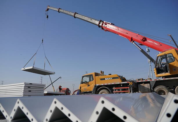 (210118) -- SHIJIAZHUANG, Jan. 18, 2021 -- Workers build the Huangzhuang apartment COVID-19 quarantine center in Shijiazhuang, north China s Hebei Province, Jan. 18, 2021. Construction of the main structures of the Huangzhuang apartment COVID-19 quarantine center in Shijiazhuang is nearing the end. With a total floor area of 34 hectares, the facility will house close contacts or secondary close contacts of COVID-19 confirmed cases. ) CHINA-HEBEI-SHIJIAZHUANG-COVID-19-QUARANTINE CENTER-CONSTRUCTION (CN) YangxShiyao 