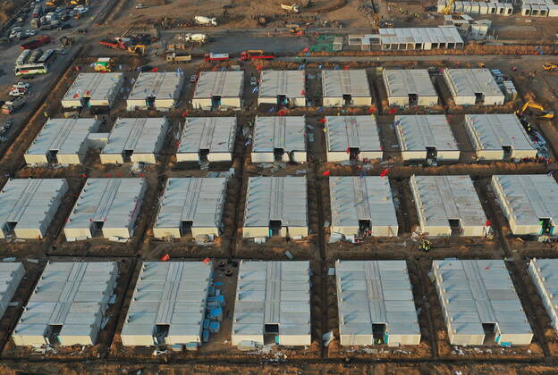 (210118) -- SHIJIAZHUANG, Jan. 18, 2021 -- Aerial photo taken on Jan. 18, 2021 shows the Huangzhuang apartment COVID-19 quarantine center under construction in Shijiazhuang, north China s Hebei Province. Construction of the main structures of the Huangzhuang apartment COVID-19 quarantine center in Shijiazhuang is nearing the end. With a total floor area of 34 hectares, the facility will house close contacts or secondary close contacts of COVID-19 confirmed cases. ) CHINA-HEBEI-SHIJIAZHUANG-COVID-19-QUARANTINE CENTER-CONSTRUCTION (CN) YangxShiyao 