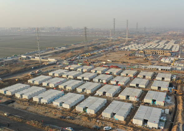 (210118) -- SHIJIAZHUANG, Jan. 18, 2021 -- Aerial photo taken on Jan. 18, 2021 shows the Huangzhuang apartment COVID-19 quarantine center under construction in Shijiazhuang, north China s Hebei Province. Construction of the main structures of the Huangzhuang apartment COVID-19 quarantine center in Shijiazhuang is nearing the end. With a total floor area of 34 hectares, the facility will house close contacts or secondary close contacts of COVID-19 confirmed cases. ) CHINA-HEBEI-SHIJIAZHUANG-COVID-19-QUARANTINE CENTER-CONSTRUCTION (CN) YangxShiyao 