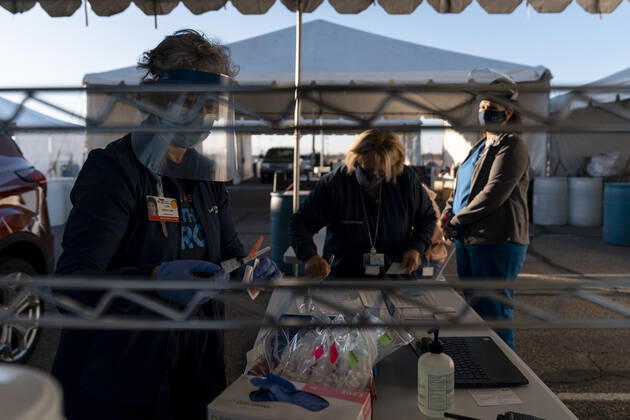 January 18, 2021, Tucson, Arizona, USA: A certified nurse prepares to administer a dose of the Moderna Inc. Covid-19 vaccine in Tucson, Arizona, U.S., January 18, 2021. Pima County is moving into Phase 1B of Covid-19 vaccinations as hospitalizations and deaths continue to climb throughout Arizona and the stateÃ¢â‚¬â ¢s new-case rate again ranked highest in the country. Tucson USA - ZUMAo111 20210118_znp_o111_004 Copyright: xCheneyxOrrx