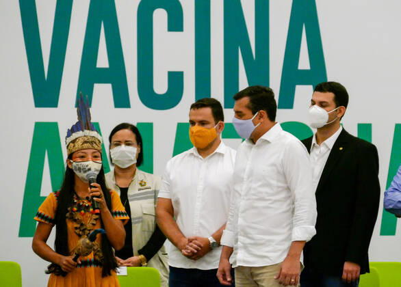 MANAUS, AM - 18.01.2021: ENFERMEIRA INDÍGENA É VACINADA EM MANAUS - Vanda Ortega, a 33-year-old nursing technician, was the first citizen of Amazonas to receive the vaccine against Covid-19, in Manaus (AM), on Monday night (18), at the launch of the vaccination campaign in State, at the Vasco Vasques Convention Center. x2020164x  SandroxPereira