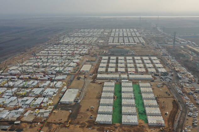 (210119) -- SHIJIAZHUANG, Jan. 19, 2021 -- Aerial photo taken on Jan. 19, 2021 shows the construction site of the Huangzhuang Apartment COVID-19 quarantine center in Shijiazhuang, north China s Hebei Province. With 606 quarantine rooms and supporting facilities delivered on Tuesday, the construction of the Huangzhuang Apartment COVID-19 quarantine center in Shijiazhuang is about to be completed. Close contacts and sub-close contacts of confirmed COVID-19 patients will be placed under medical observation in the new center with a total of 4,156 rooms. ) CHINA-HEBEI-SHIJIAZHUANG-COVID-19-QUARANTINE CENTER-CONSTRUCTION (CN) YangxShiyao 