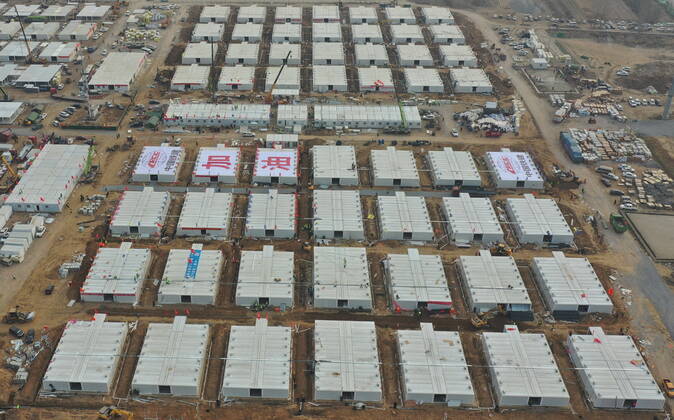 (210119) -- SHIJIAZHUANG, Jan. 19, 2021 -- Aerial photo taken on Jan. 19, 2021 shows the construction site of the Huangzhuang Apartment COVID-19 quarantine center in Shijiazhuang, north China s Hebei Province. With 606 quarantine rooms and supporting facilities delivered on Tuesday, the construction of the Huangzhuang Apartment COVID-19 quarantine center in Shijiazhuang is about to be completed. Close contacts and sub-close contacts of confirmed COVID-19 patients will be placed under medical observation in the new center with a total of 4,156 rooms. ) CHINA-HEBEI-SHIJIAZHUANG-COVID-19-QUARANTINE CENTER-CONSTRUCTION (CN) YangxShiyao 