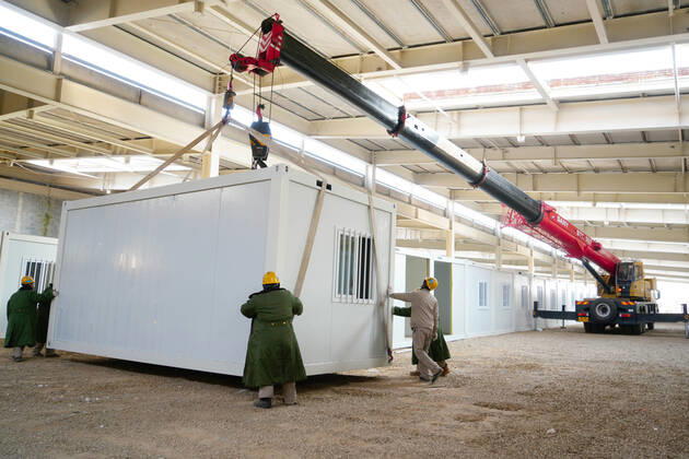 (210119) -- SHIJIAZHUANG, Jan. 19, 2021 () -- Workers build a COVID-19 quarantine center in Nangong City, north China s Hebei Province, Jan. 19, 2021. () CHINA-HEBEI-NANGONG-COVID-19-QUARANTINE CENTER-CONSTRUCTION (CN) Xinhua 