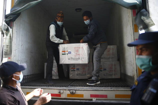 January 21, 2021, Kathmandu, Nepal: Hospital staff unload Covid-19 AstraZeneca vaccines that arrived from India at Department of Health Services in Kathmandu, Nepal on Thursday, January 21, 2021. India under the Ã¢â‚¬ËœVaccine MaitriÃ¢â‚¬Â initiative is providing vaccines, in aid to Nepal with 1 million doses of vaccine against the coronavirus. Kathmandu Nepal - ZUMAg200 20210121_zap_g200_002 Copyright: xSkandaxGautamx
