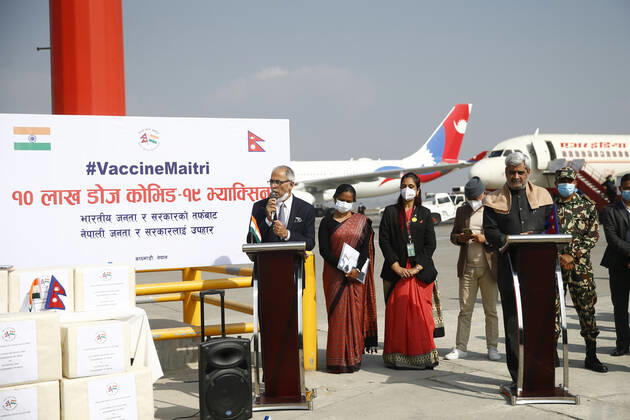 January 21, 2021, Kathmandu, Nepal: Indian Ambassador to Nepal Vinay Mohan Kwatra (Left) and Health Minister Hridayesh Tripathi (Right) speak during a joint press meet regarding Covid-19 AstraZeneca vaccines that arrived from India at Tribhuvan International Airport in Kathmandu, Nepal on Thursday, January 21, 2021. India under the Ã¢â‚¬ËœVaccine MaitriÃ¢â‚¬Â initiative is providing vaccines, in aid to Nepal with 1 million doses of vaccine against the coronavirus. Kathmandu Nepal - ZUMAg200 20210121_zap_g200_004 Copyright: xSkandaxGautamx
